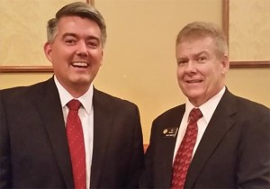 Sen. Cory Gardner, left, poses for an awkward photo with state Sen. Tim Neville